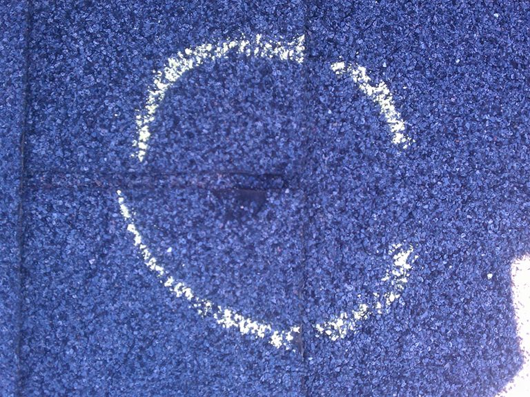 Close up of a damaged roof shingle