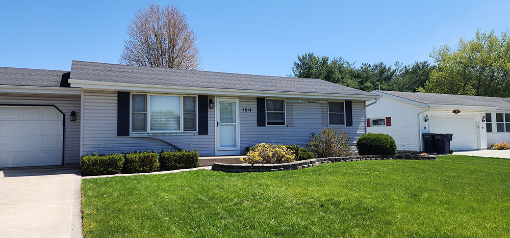 A well-maintained single-story home with a new roof and siding
